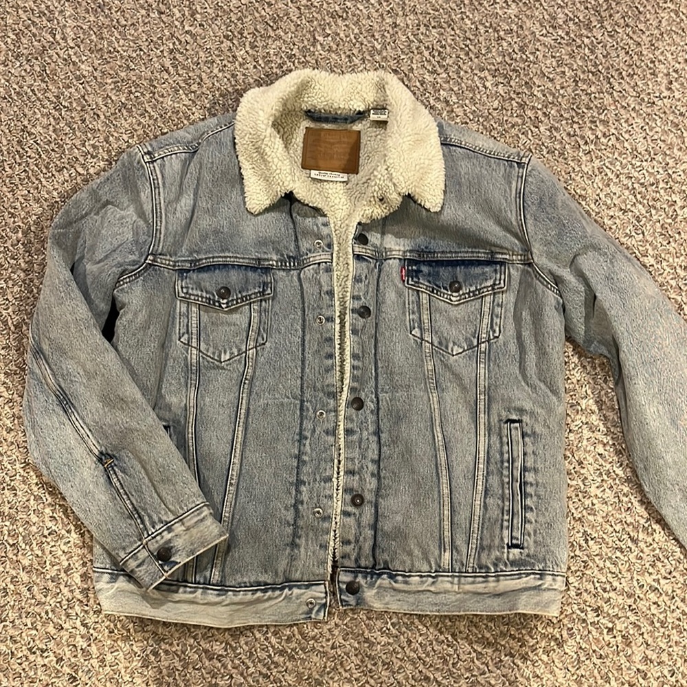 Never worn Levi’s premium shearling lined denim jacket